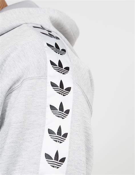 sudadera adidas originals overhead tape hoody